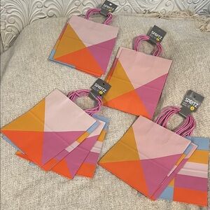 Spritz Vibrant Triangular Gift Bags. 4 pkgs with 4 in each. Total of 16 bags.